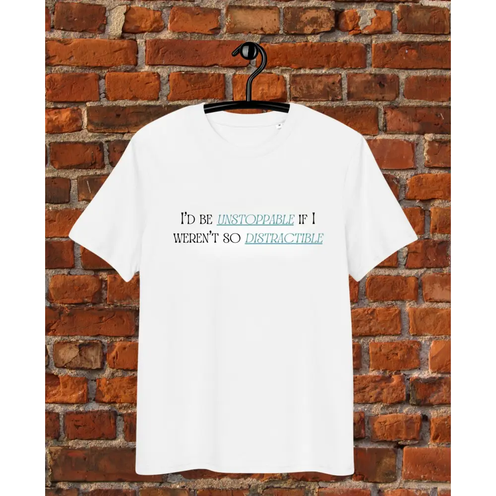 White t-shirt with text on a hanger against a brick wall I'd be unstoppable if i weren't so distractible