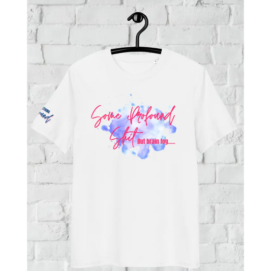 White sweatshirt with colorful text design on a hanger against a white brick wall.