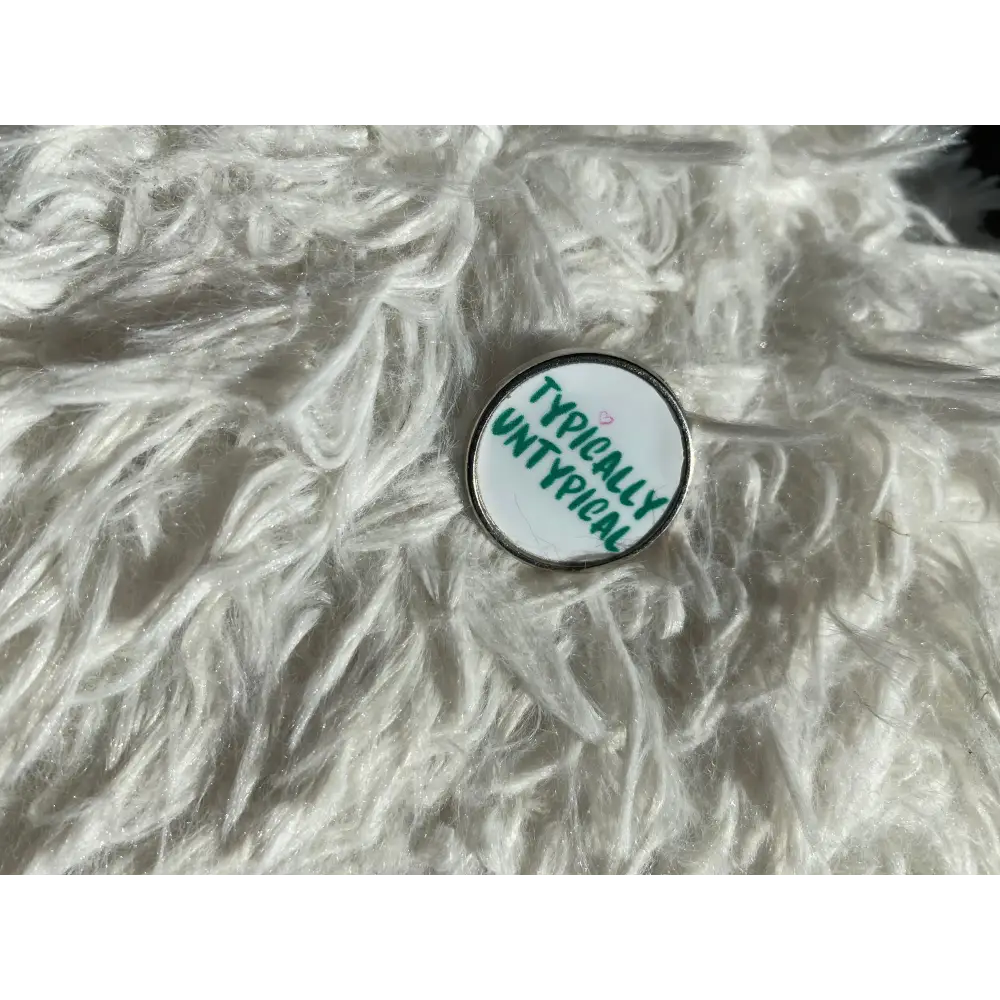The Untypical OT - Typically Untypical pin badge - Badge