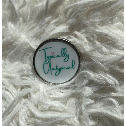 The Untypical OT - Typically Untypical pin badge - Badge