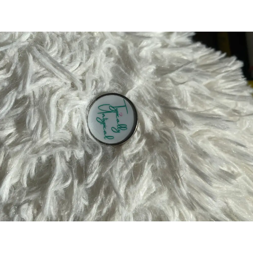 The Untypical OT - Typically Untypical pin badge - Badge