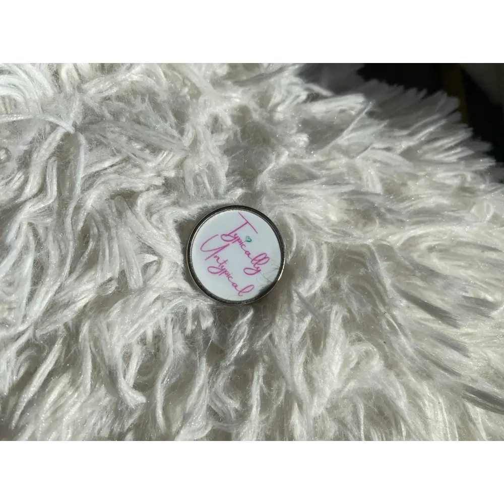 The Untypical OT - Typically Untypical pin badge - Badge