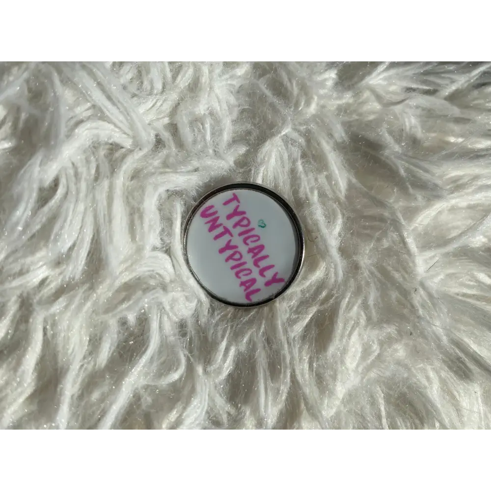 The Untypical OT - Typically Untypical pin badge - Badge