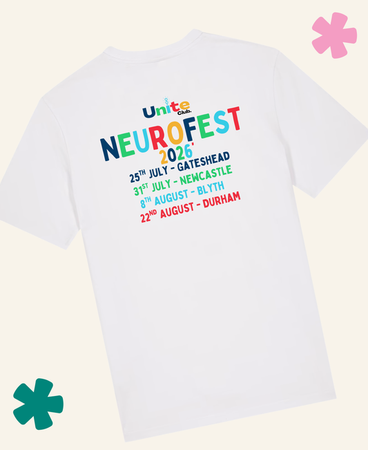 A white short-sleeve t-shirt shown from the back, featuring a colorful graphic print for 'Unite NeuroFest 2026' with event dates listed in rainbow-colored text. The t-shirt is displayed on a light cream background with decorative pink and teal flower graphics in the corners. Unite Club x Something Profound