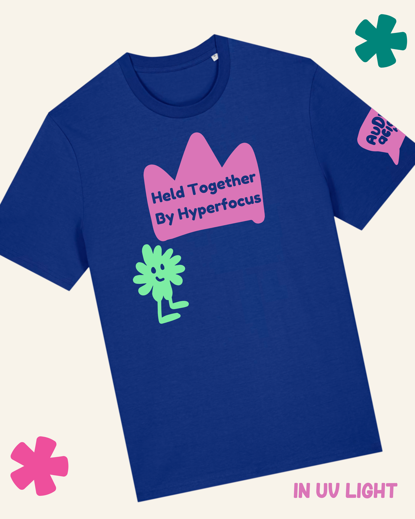 Blue t-shirt with pink crown and green character graphic on a white background