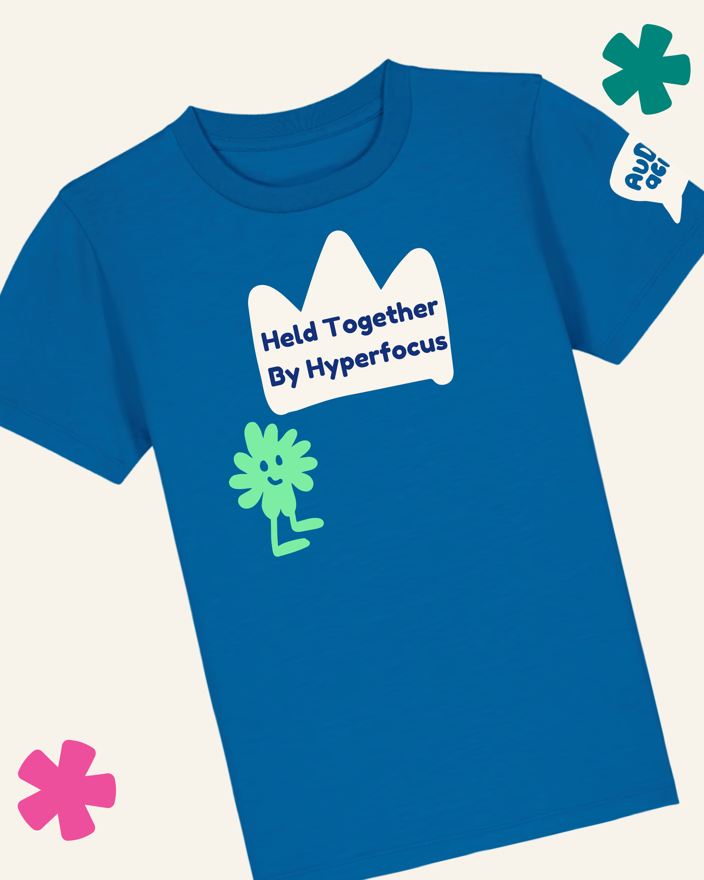 Blue t-shirt with white and green graphics and text on a light gray background