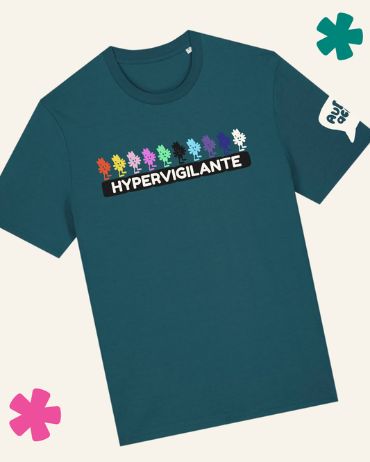 Teal t-shirt with colorful tree graphics and 'HYPERVIGILANTE' text on a white background