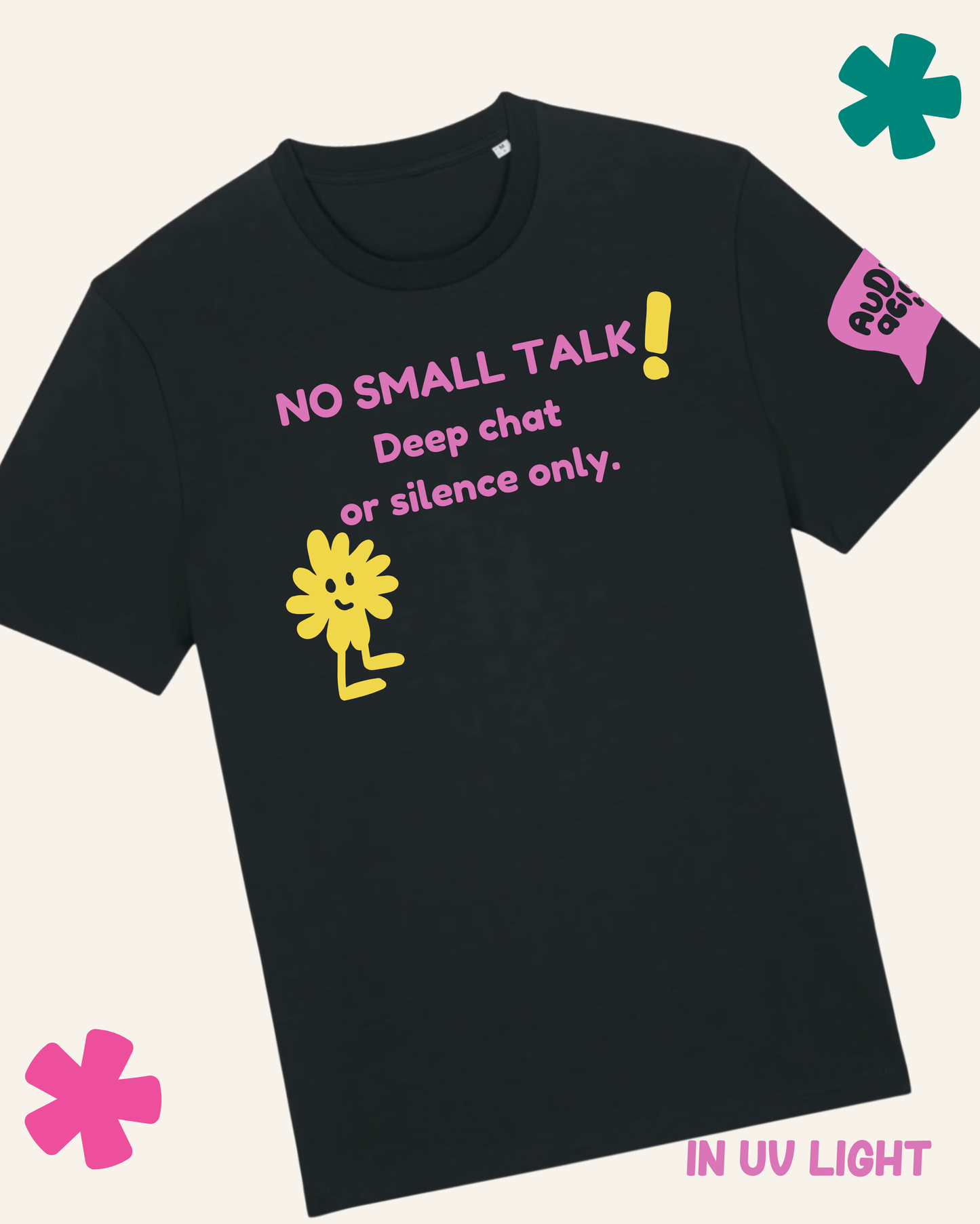 Black t-shirt with pink and yellow text and graphics on a light gray background