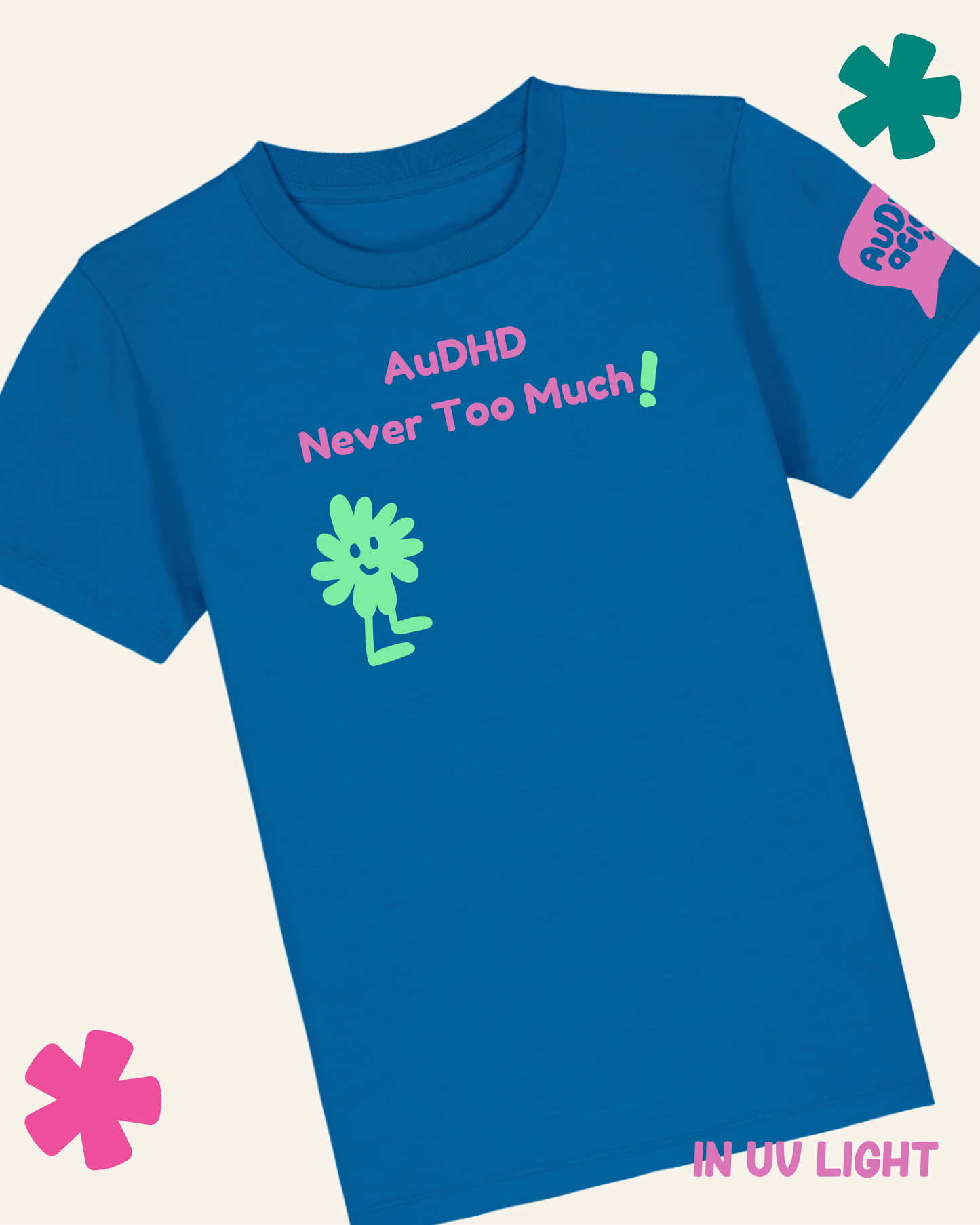 Blue t-shirt with 'AuDHD Never Too Much!' text and green graphic on a white background