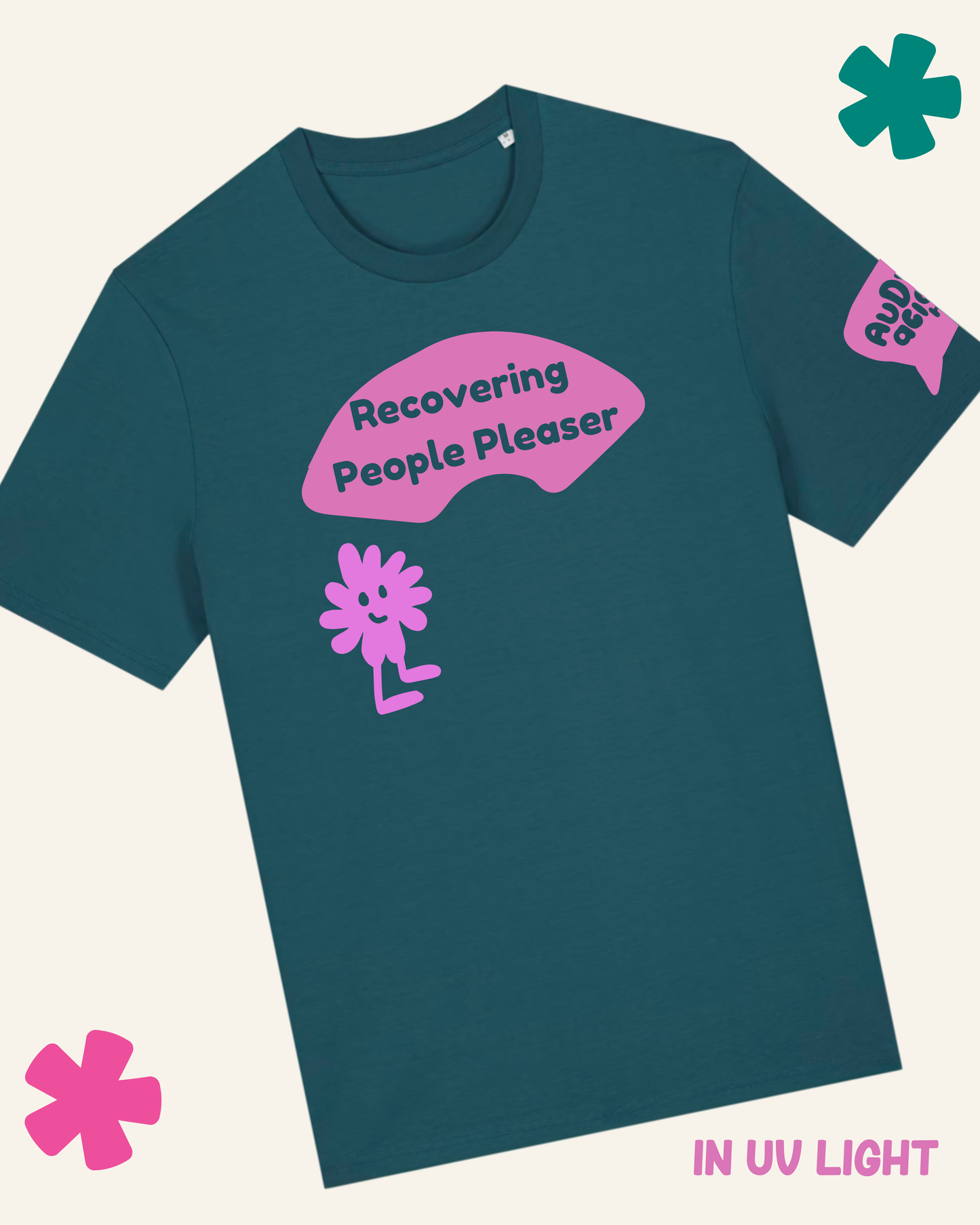 Teal t-shirt with pink graphic and text 'Recovering People Pleaser' on a white background