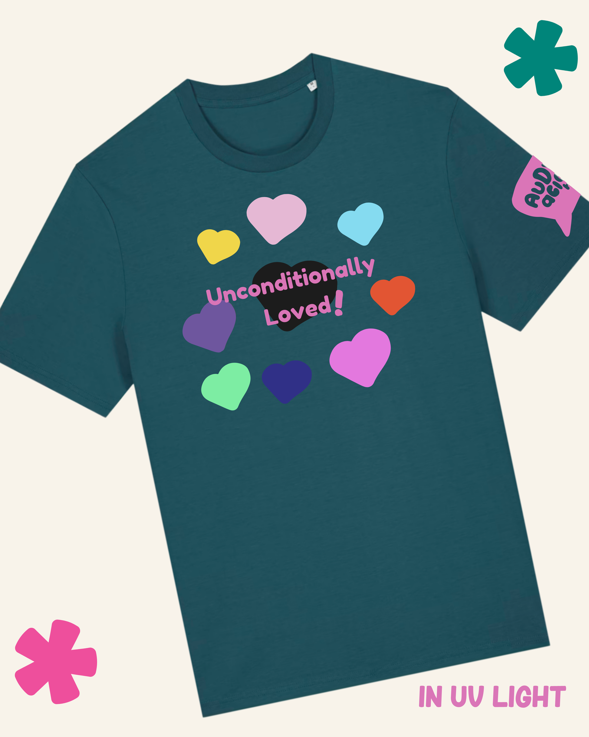 Teal t-shirt with colorful hearts and 'Unconditionally Loved!' text on a light gray background