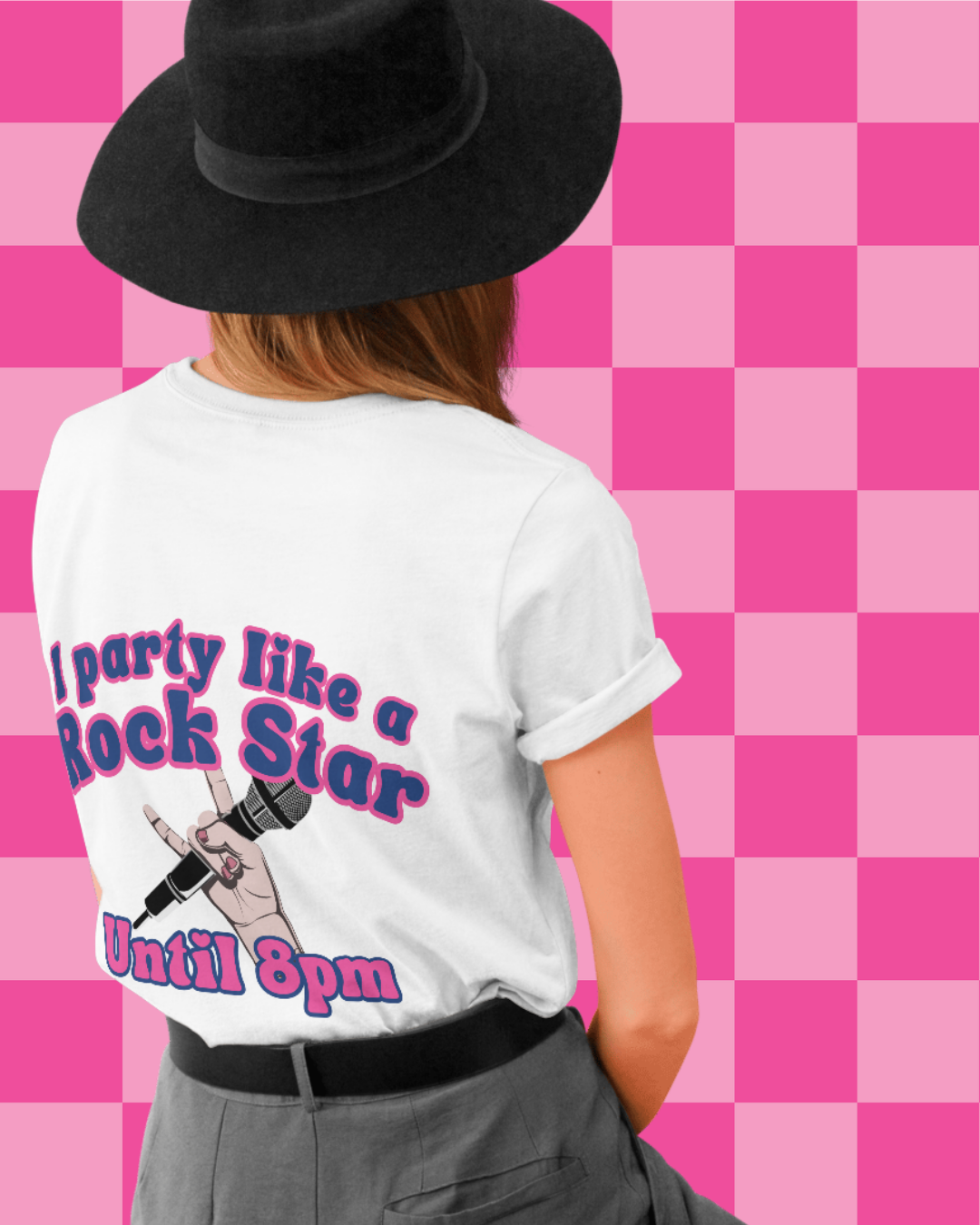 Person wearing a white t-shirt with a graphic and I party like a rock star, standing against a pink checkered background