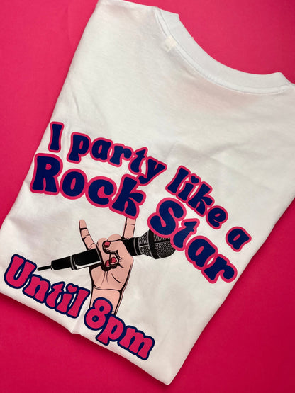 White t-shirt with 'I party like a rock star until 8pm' text and microphone graphic on a pink background