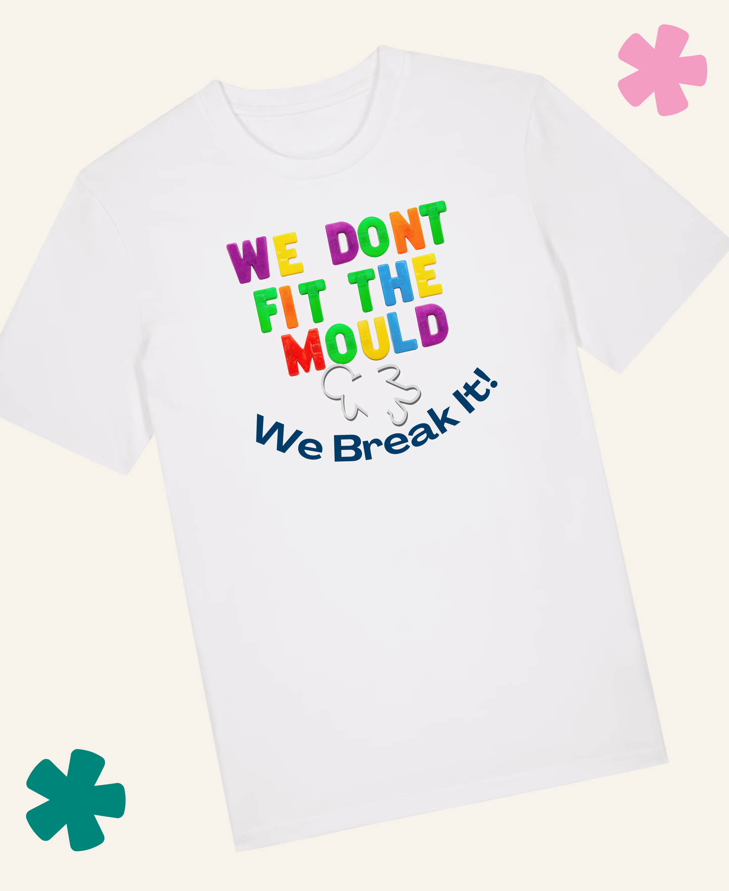 A white short-sleeve t-shirt with a colorful graphic text reading 'WE DONT FIT THE MOULD We Break It!' in rainbow letters, displayed on a light cream background with decorative teal and pink flower graphics. Unite Club x Something Profound