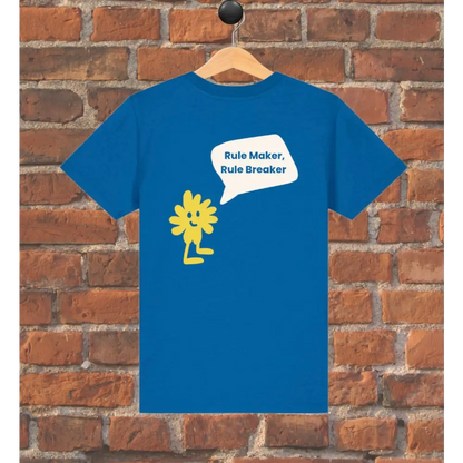 Blue t-shirt with yellow graphic and text on a wooden hanger against a brick wall.