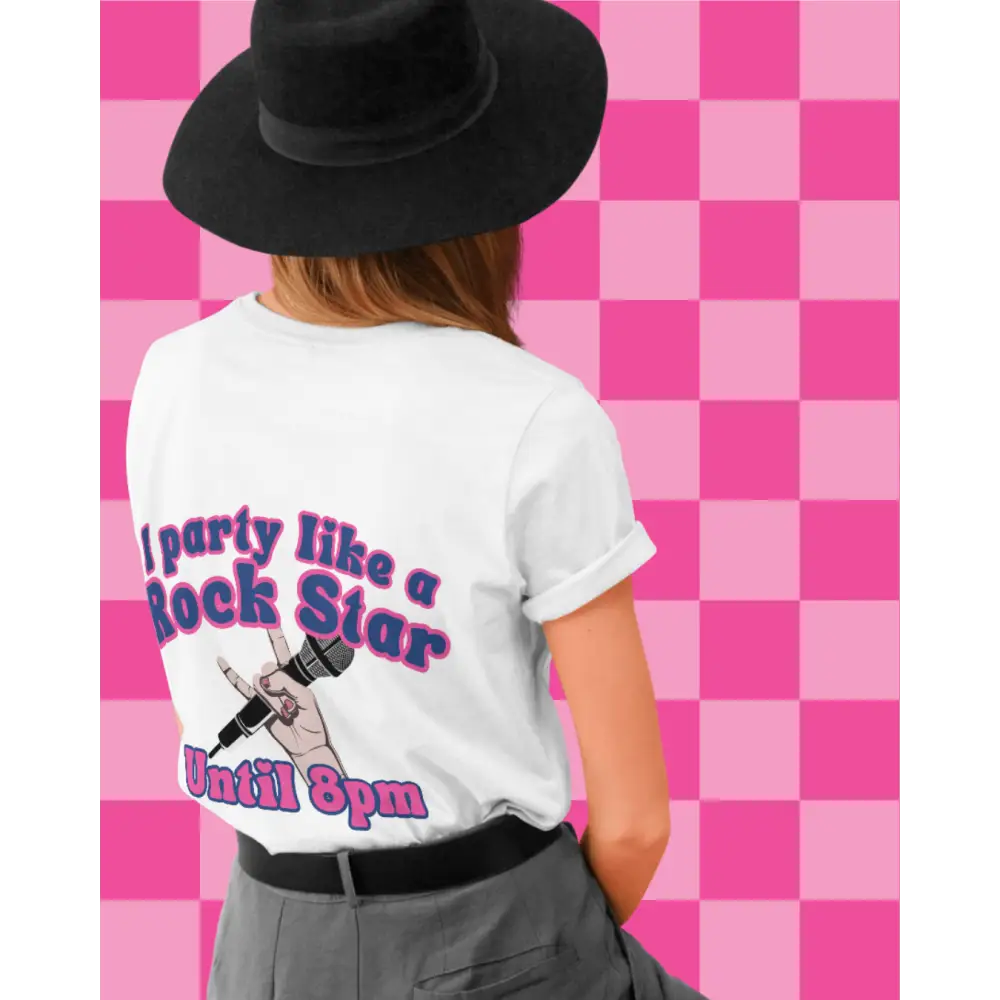 Person wearing a white t-shirt with a graphic and I party like a rock star, standing against a pink checkered background