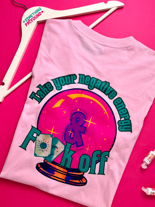 Pink t-shirt with graphic design and text on a pink background