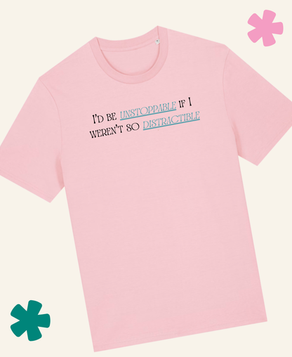 Pink t-shirt with humorous text design on a light pink background