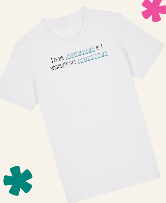 White t-shirt with colorful text on a light background